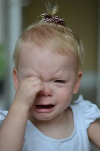 Brylee, age 2, crying after a buffering video interrupted her show