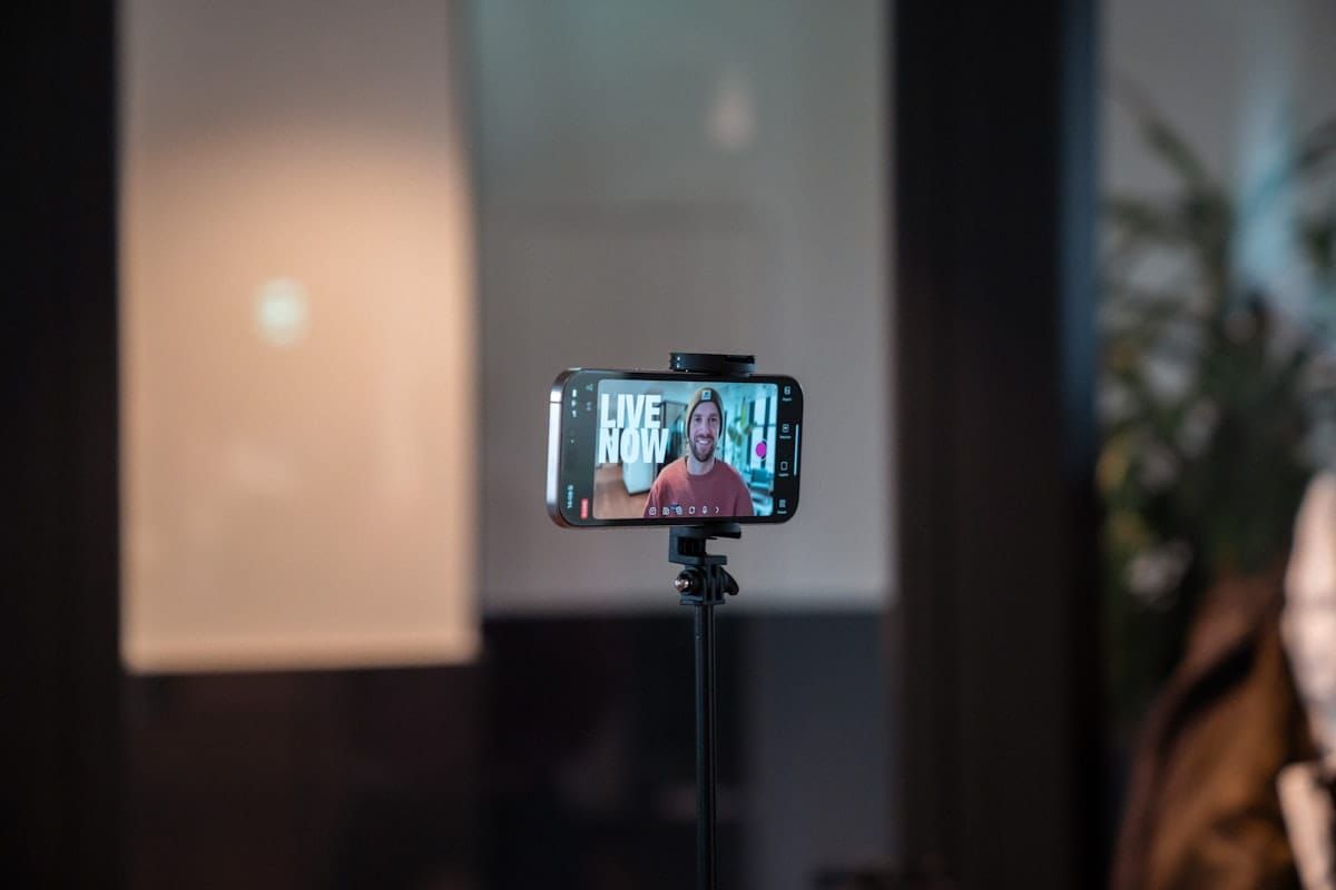 Smartphone tripod filming setup with ring light