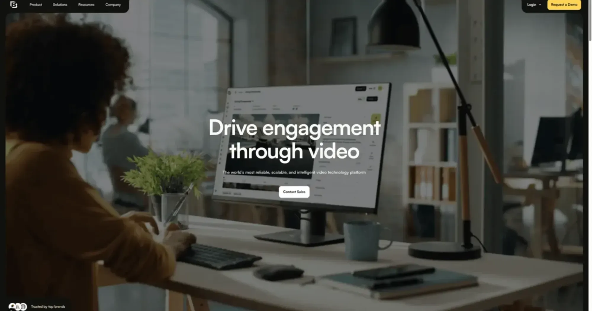 Brightcove homepage headline "Drive engagement through video" above a Contact Sales button