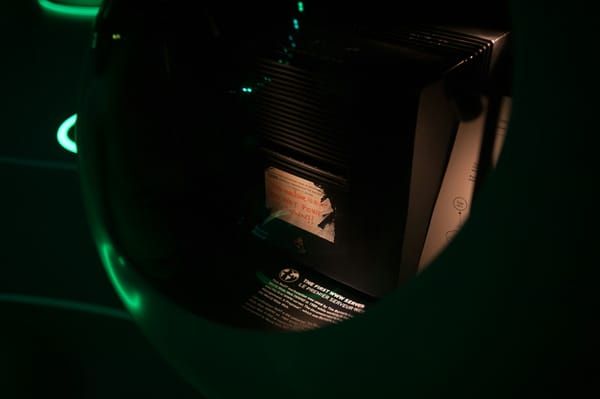 Server room with rows of data center racks representing video CDN infrastructure