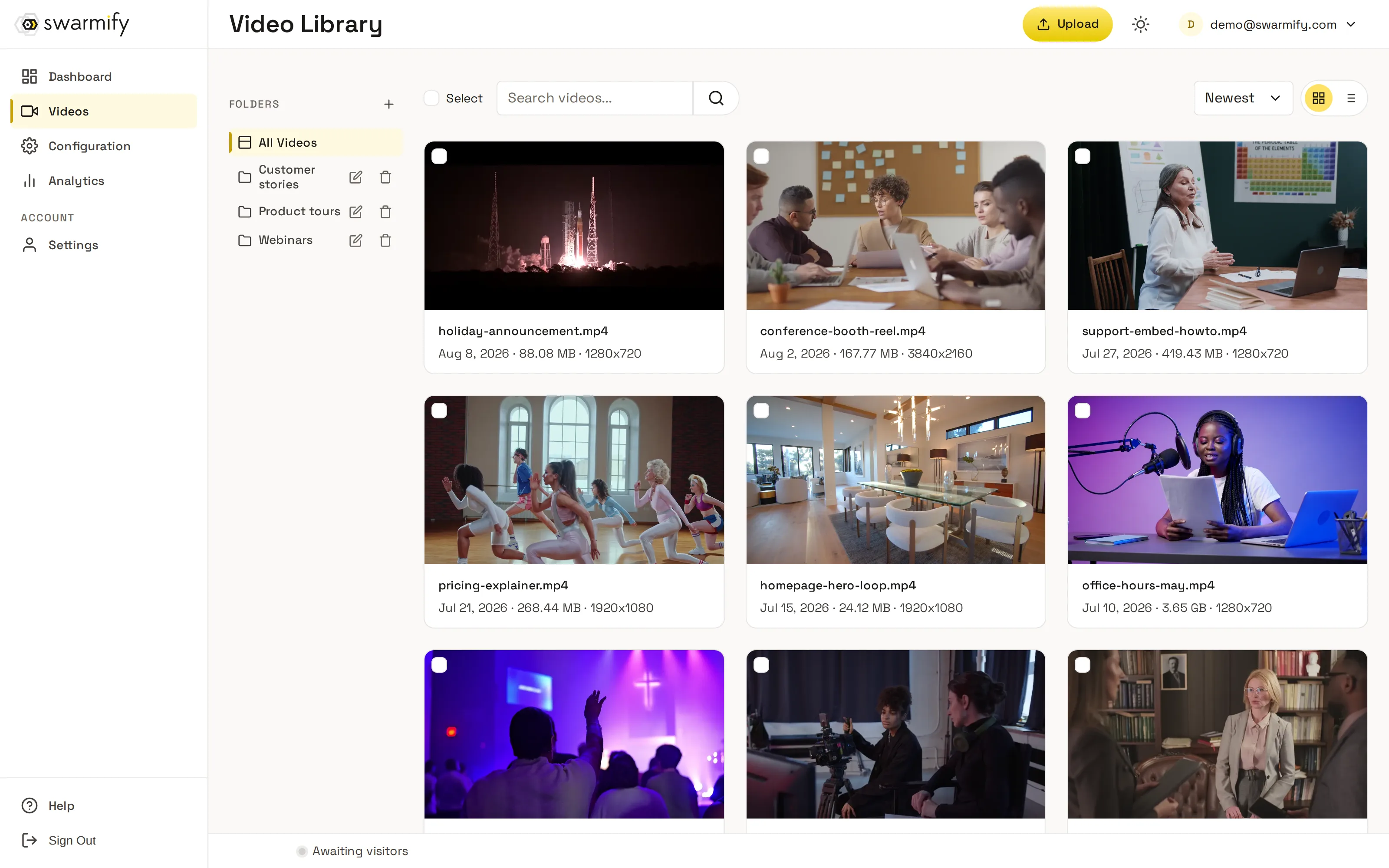SmartVideo dashboard — video library with folders and upload